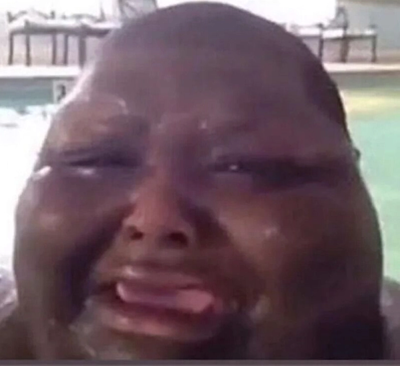 Hình ảnh meme anh da đen thể hiện sự thất vọng và mệt mỏi với cuộc sống