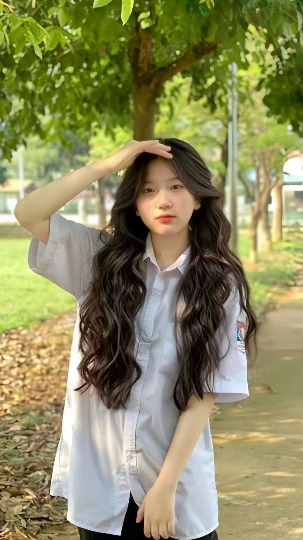 ảnh gái xinh k11 rạng rỡ với mái tóc bồng bềnh