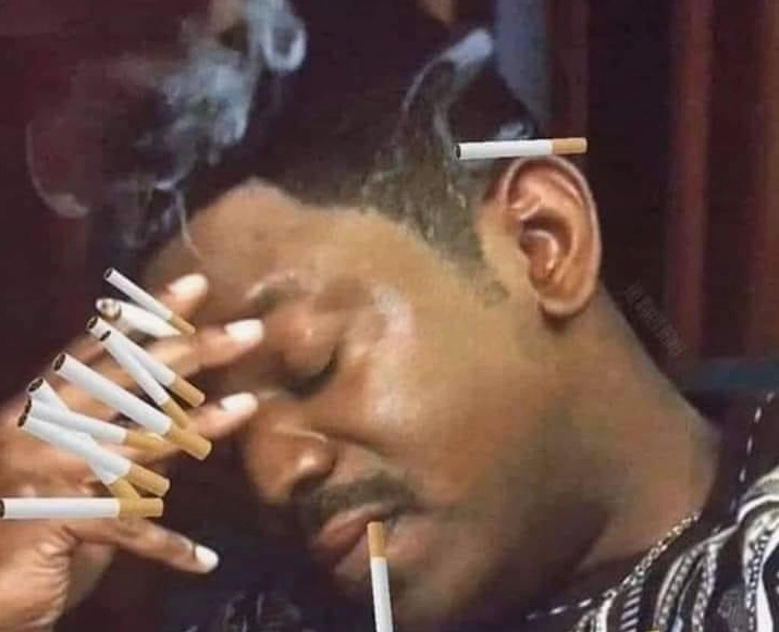 Ảnh meme anh da đen hút thuốc với vẻ mặt cool ngầu