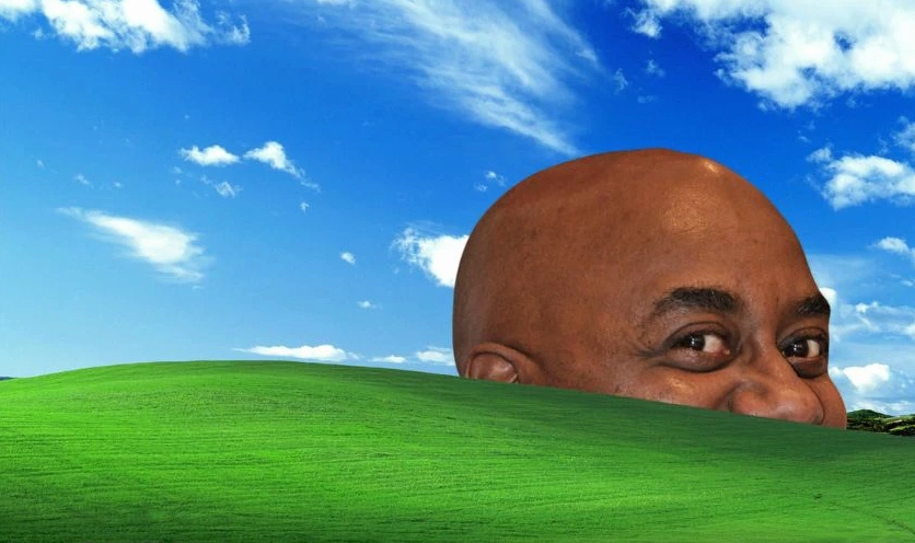 Hình nền meme logo Windows có khuôn mặt hài hước cho laptop