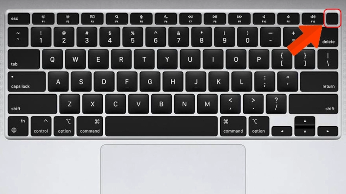 Nhấn phím nguồn trên bàn phím Macbook