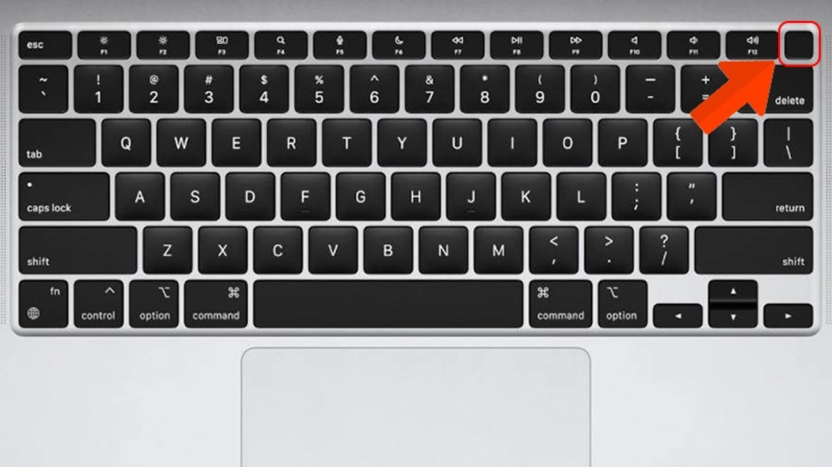 Nhấn phím nguồn trên bàn phím Macbook