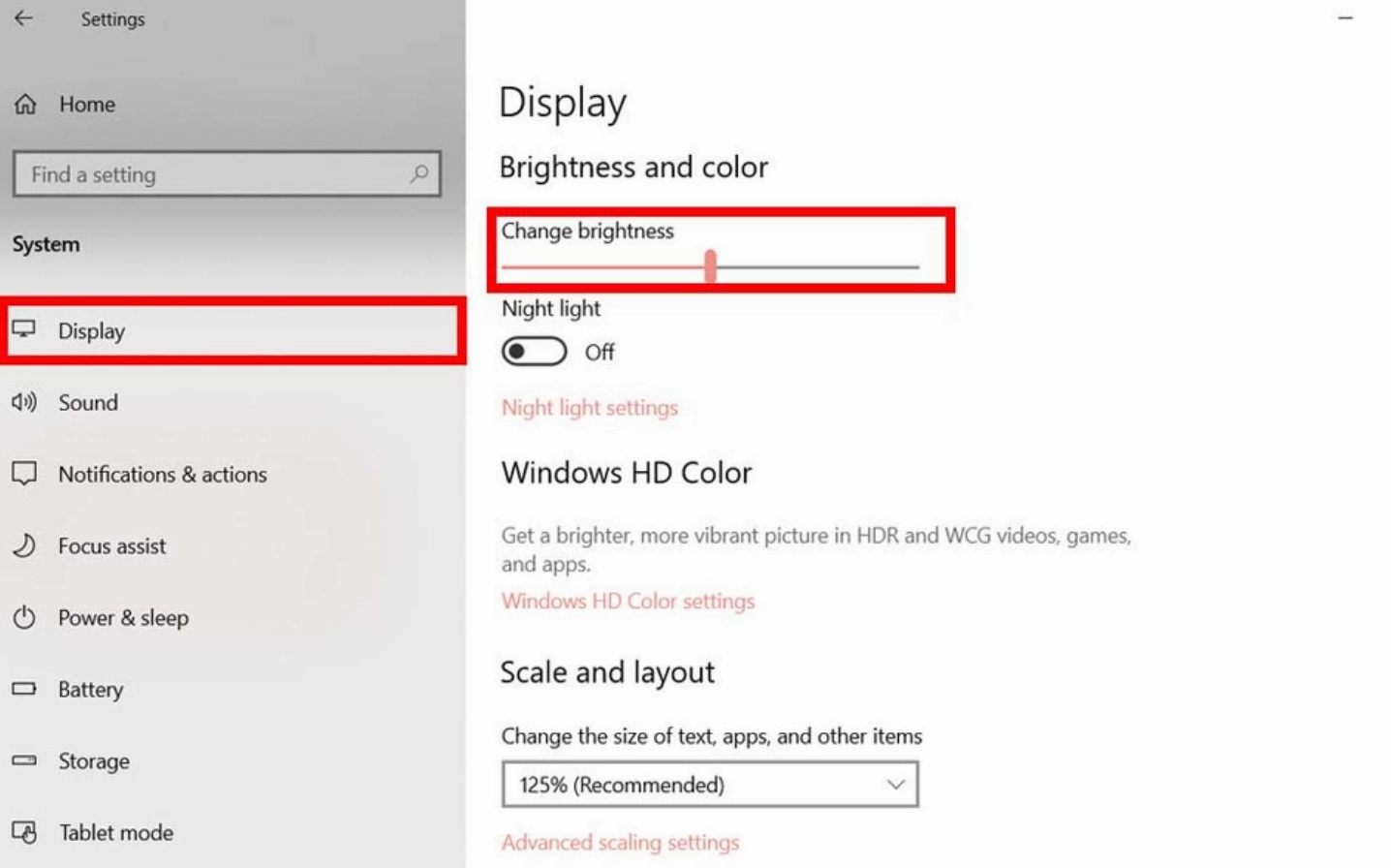 Sử dụng chuột kéo thanh trượt tại mục Change brightness trong cửa sổ Setting Display